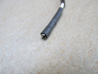 2.62 mm wide female spade terminal.