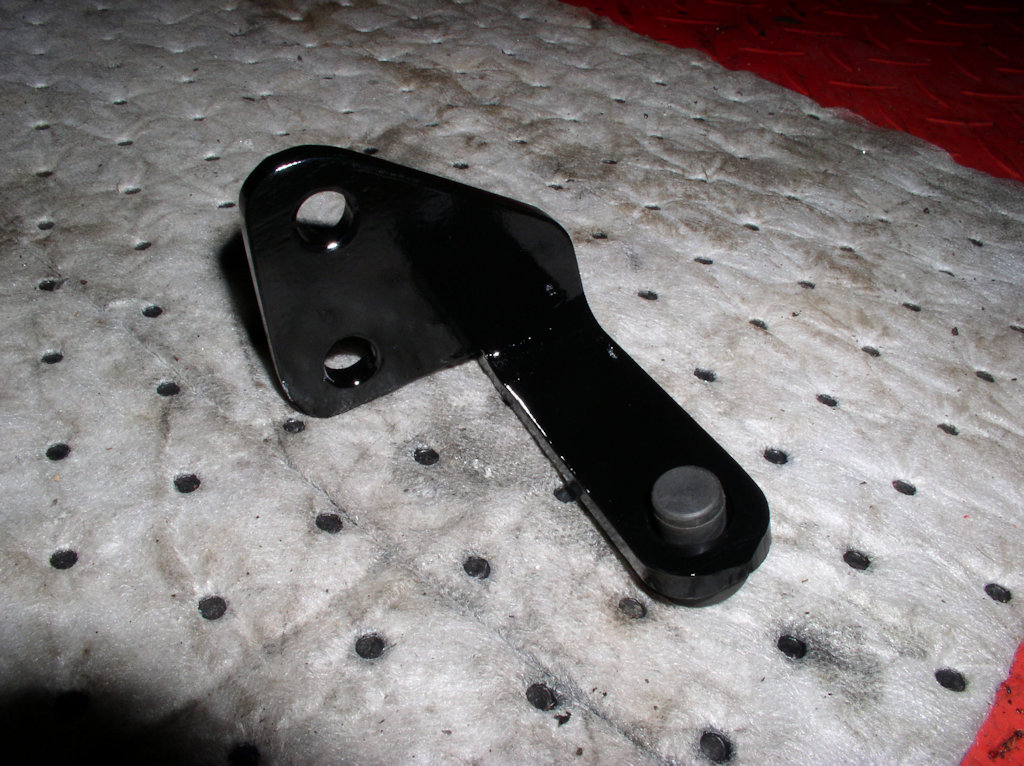 Bolt-on center stand stop tab for Moto Guzzi V700, V7 Special, Ambassador, 850 GT, 850 GT California, Eldorado, and 850 California Police models.