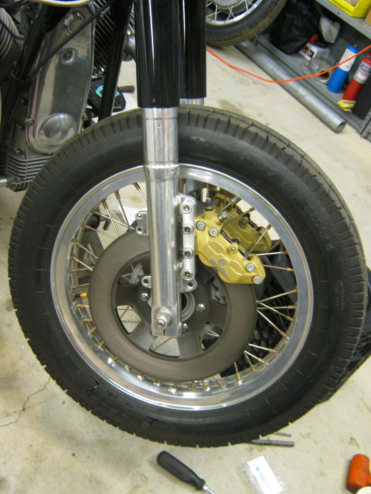 Disc brake configuration using 4 piston calipers. Applicable to Moto Guzzi V700, V7 Special, Ambassador, 850 GT, 850 GT California, Eldorado, and 850 California Police models.