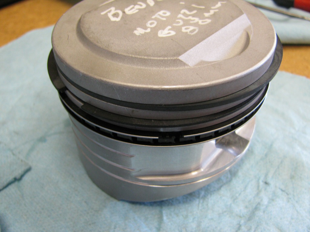 Rings fit to the left piston. This series of photos is intended to show the careful ring gap placement, as per the instructions provided by the piston ring manufacturer (TotalSeal).