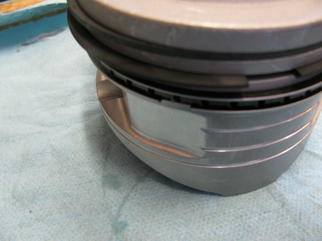 Rings fit to the left piston. This series of photos is intended to show the careful ring gap placement, as per the instructions provided by the piston ring manufacturer (TotalSeal).