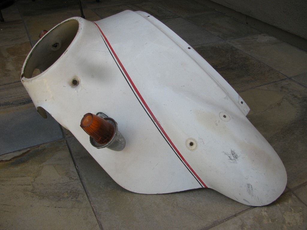 Moto Guzzi fairing (MG# 12575421). Lights are not original.