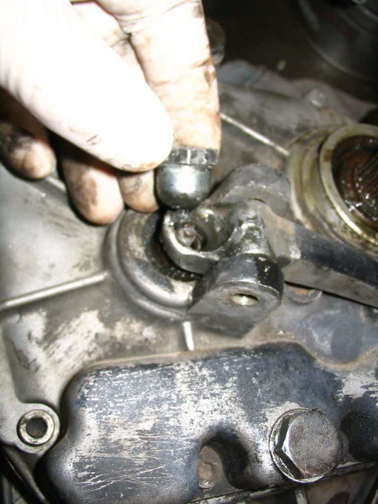 Remove the adjustment nut.