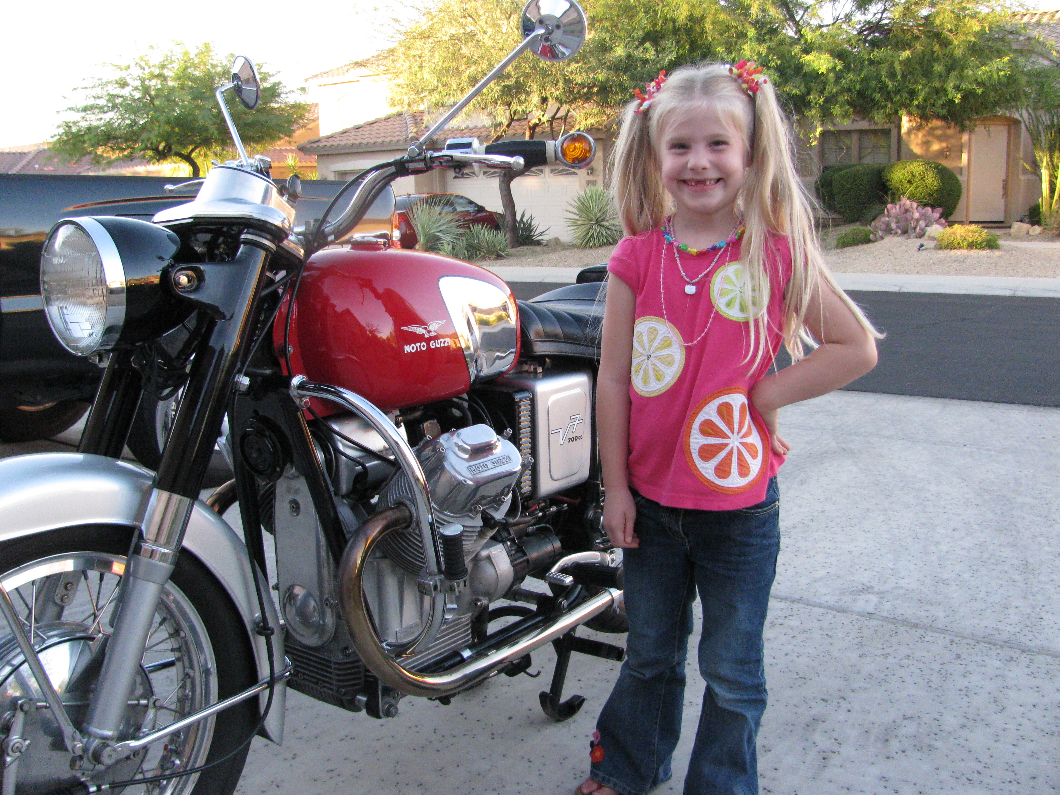 Robert Scharf's Moto Guzzi V700 with Darby Anne Bender.