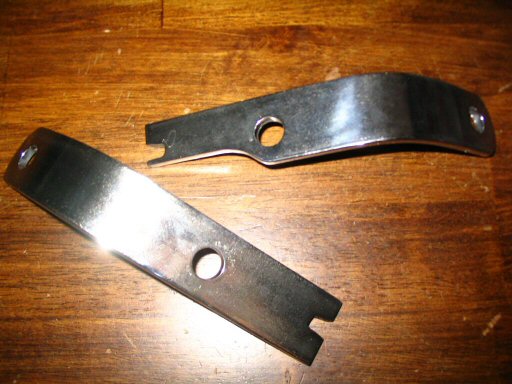 The pair of stainless steel civilian turn signal brackets that I created.