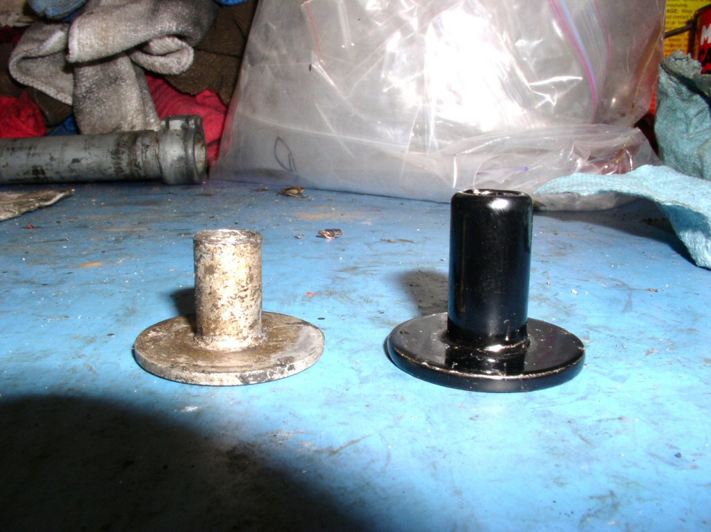 Early tank bushing vs. later tank bushing. 