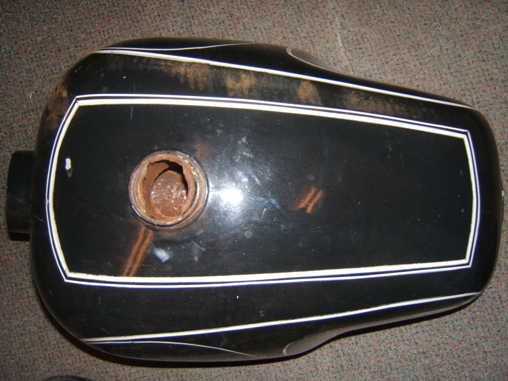 Original pin striping on the fuel tank: top rectangle.