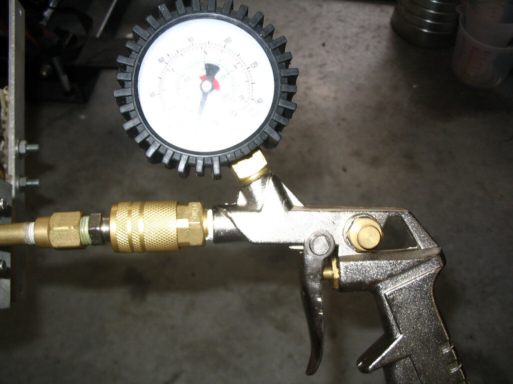 Pressure tester for an oil pressure relief valve.