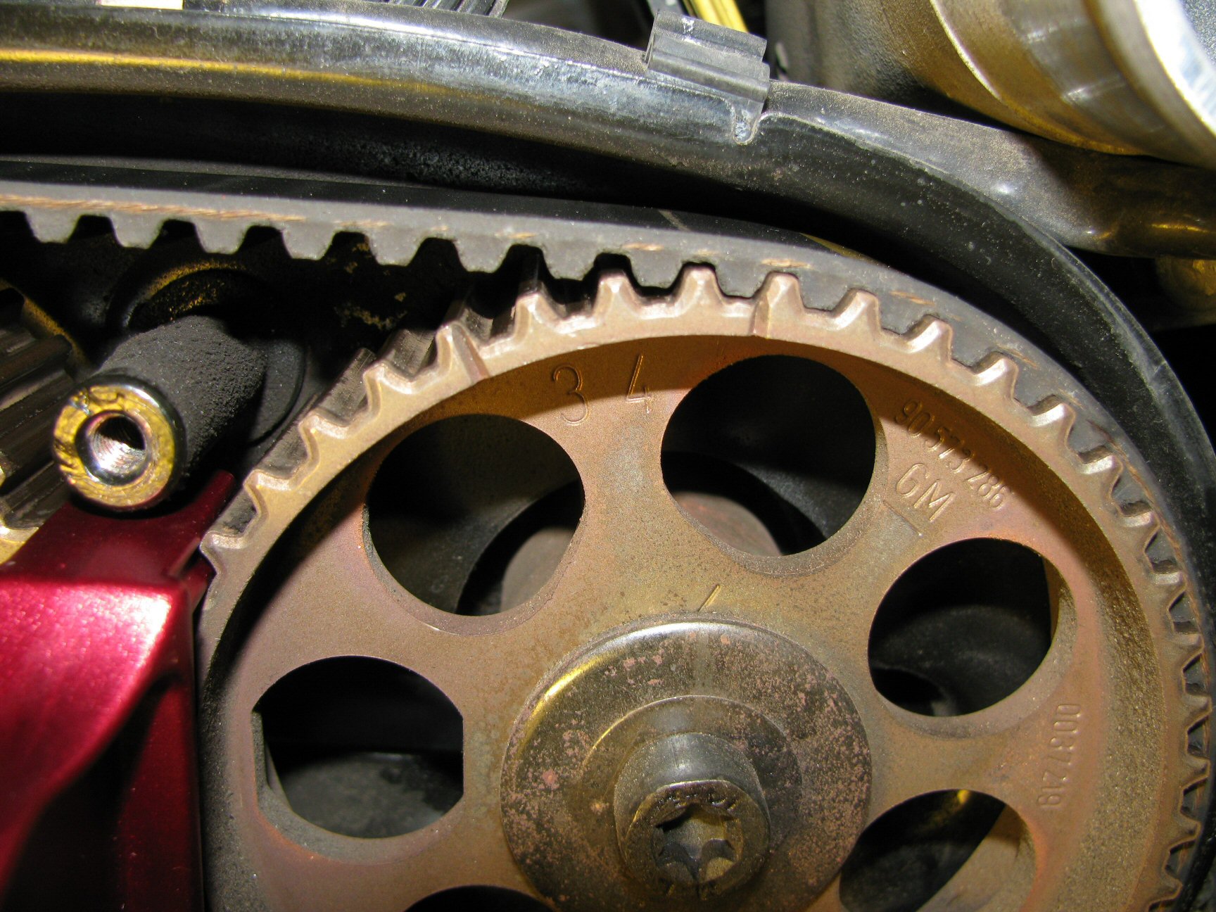 Camshaft pulley 4 aligned with notch in backing tin.